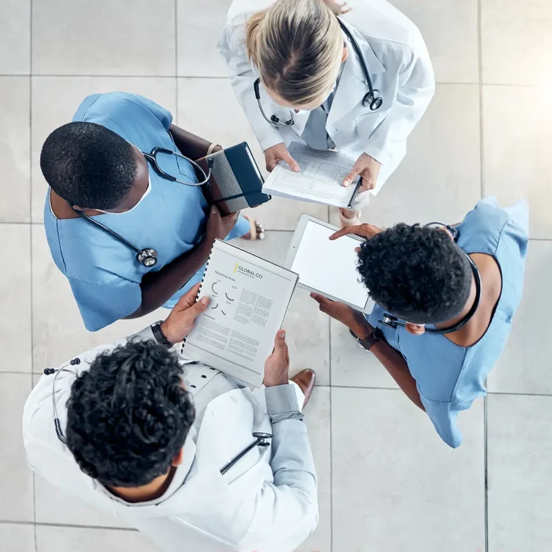 doctor-documents-tablet-collaboration-diagnosis-medical-research-hospital-healthcare-professionals-working-with-technology-data-paperwork-teamwork-clinic